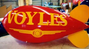 Advertising Blimps - Voyle's logo - custom helium balloons made in the USA.